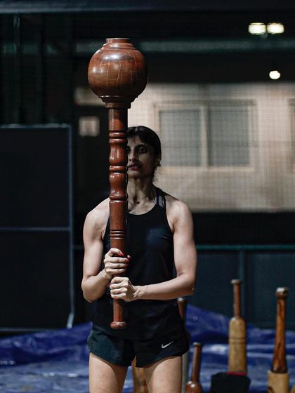 A moment of pure focus. Holding the Gada requires your entire body to be engaged, from your grip to your core to your feet anchoring you to the ground.