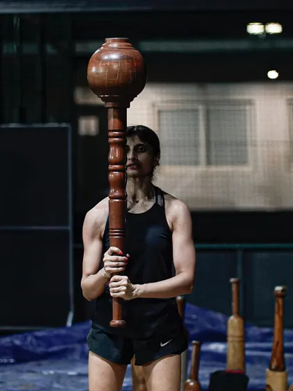 A moment of pure focus. Holding the Gada requires your entire body to be engaged, from your grip to your core to your feet anchoring you to the ground.