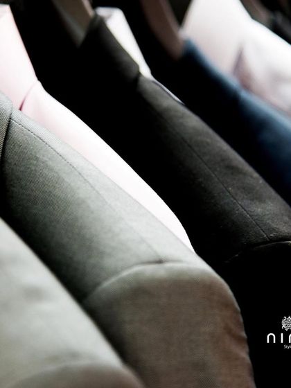 A rack of our finely tailored blazers and suits. Whether you need something formal, casual, or in-between, we have a style for you.