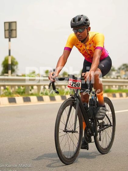 An elite rider, focused on the road ahead.