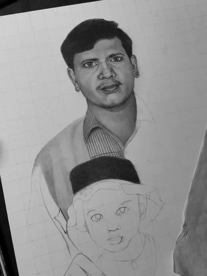 An earlier stage of the family portrait. The father's face is almost complete, while the child's is still a line drawing. This shows how I build up each person individually.
