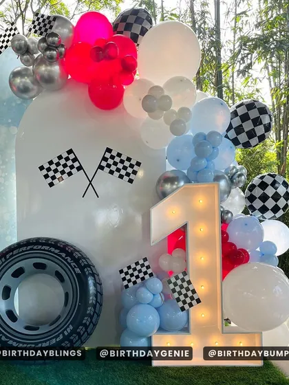 This angle highlights the light-up number '1' and the checkered flag balloons.
