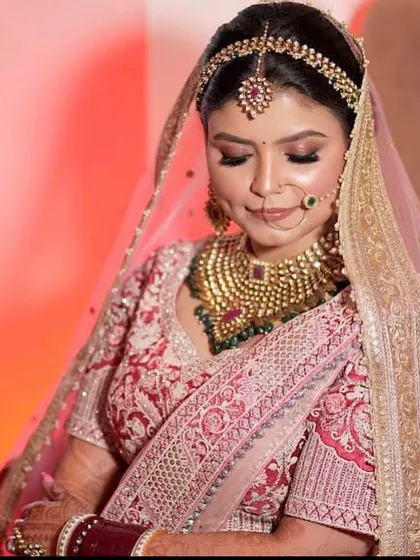 A serene portrait of the bride, her eyes closed, looking peaceful and beautiful.