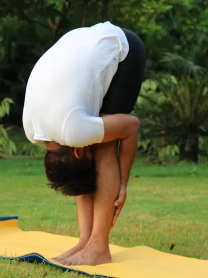 Uttanasana (Standing Forward Bend) is more than just a hamstring stretch. It calms the brain, helps relieve stress, and allows you to turn your awareness inward.