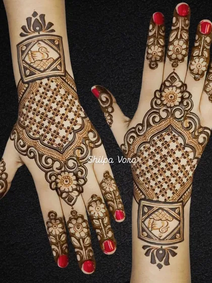 The same elegant swan design against a dark background, highlighting the clean lines and intricate details.