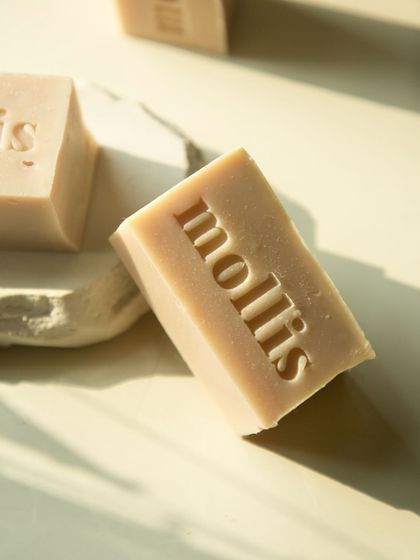 A single bar of the restocked Japanese Cherry Blossom soap, simple and elegant.