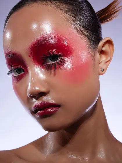 Another angle of the glazed, AI-inspired glass skin look, showing the incredible shine and texture achieved by our student.