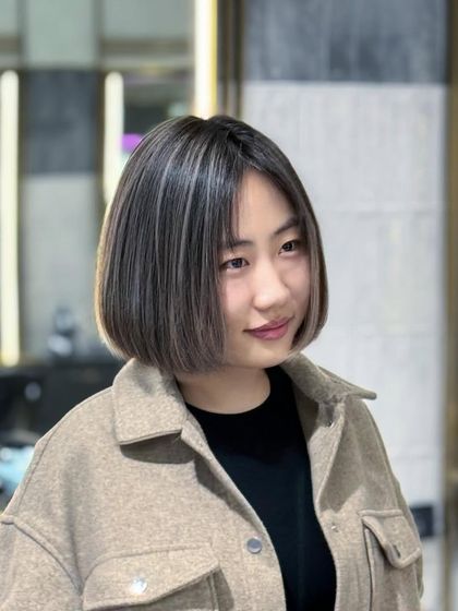 A good hair day starts with a good haircut. This ash-colored bob is sleek, modern, and effortlessly stylish.