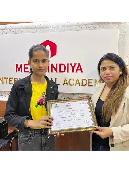 A special moment on Certificate Day. We wish our graduate all the best as she embarks on her professional path.