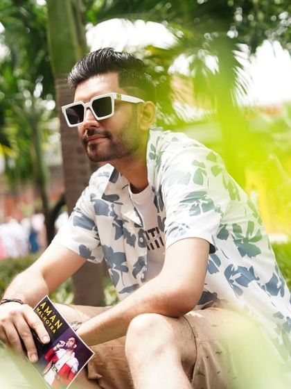 Holding my show notes, ready for a poolside event. The setting may be relaxed, but the energy is always high.