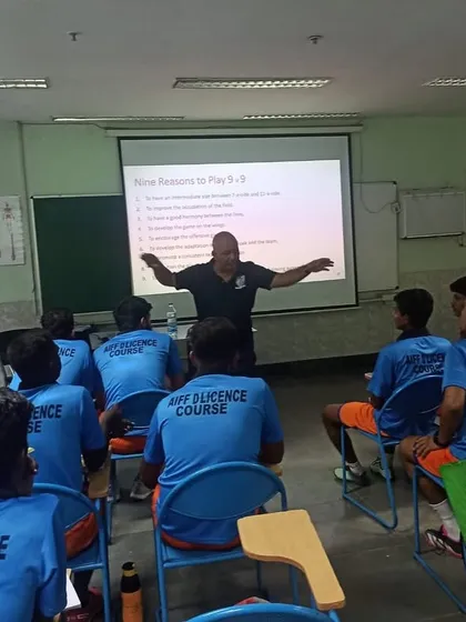 A classroom session for our coaches during their AIFF D License course. The theoretical side of the game is just as important as the practical.