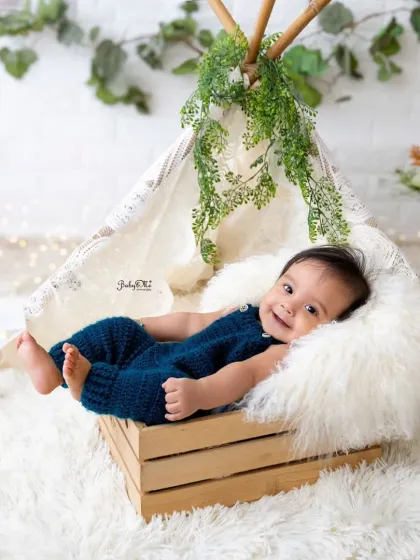 Just chilling. This laid-back pose is so cute and shows off his happy personality during his sitter session.