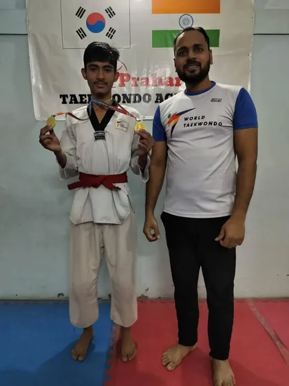 This red belt student won two gold medals at the district championship.