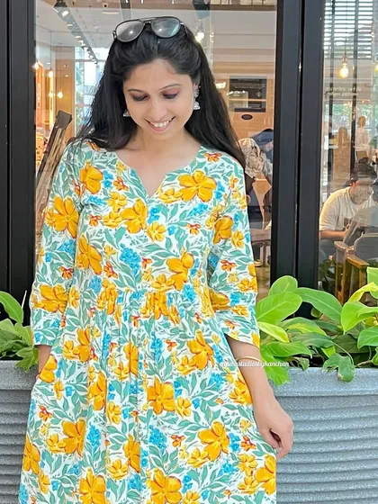 Another look at my popular yellow and blue floral printed set. The kurta is long enough to be a dress, and it comes with pockets.