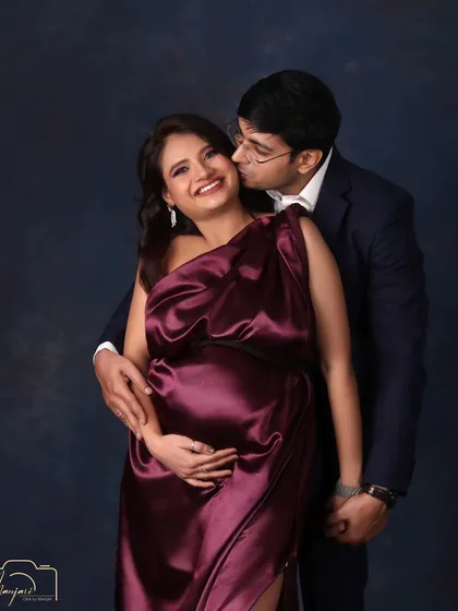 A joyful and radiant portrait. The genuine smiles on this couple's faces make this a heartwarming and beautiful memory.