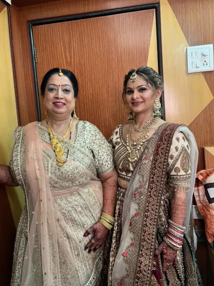 A heartwarming photo of a bride with her mother. I had the pleasure of doing makeup for both, creating looks that were beautiful and age-appropriate.