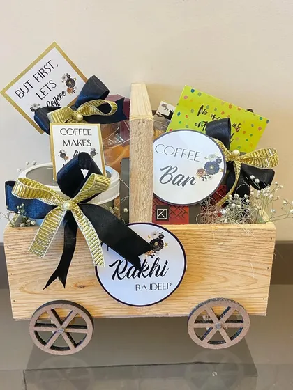 For the coffee-loving sibling, our 'But first, Let's Coffee' cart is the perfect Rakhi gift. This wooden cart is loaded with everything needed for a perfect brew.