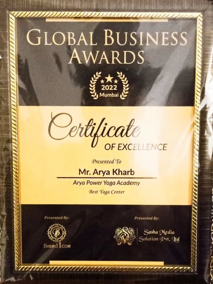 A close-up of our Certificate of Excellence for 'Best Yoga Center'. A testament to the dedication of our team and the trust of our students.