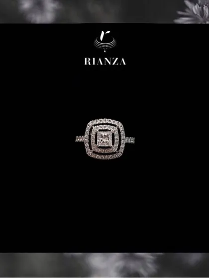 For those who prefer a more modern aesthetic, this ring features a princess-cut diamond in a double square halo setting. The geometric lines give it a chic and contemporary feel.