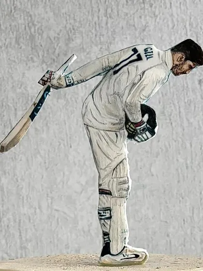 A close-up of the hand-painted cake topper we made for cricketer Shubman Gill's birthday. Our artist did an incredible job capturing his iconic pose.