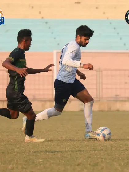 A player dribbles down the line, looking to create an opportunity from out wide.