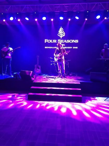 Another view of the stage at the Four Seasons, showcasing the professional setup for the event.