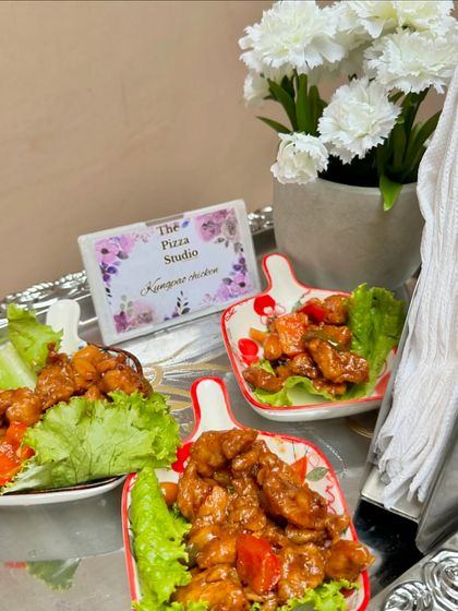 Our Kung Pao chicken is served in individual portions on a bed of lettuce. This dish is a great example of the delicious Pan-Asian flavors we incorporate into our appetizer menu.