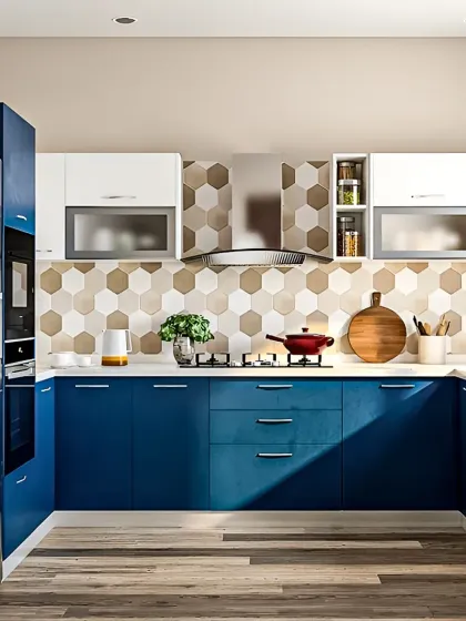 This U-shaped modular kitchen is designed for efficiency and style. The bold blue cabinetry is paired with a geometric honeycomb backsplash and crisp white countertops, creating a vibrant and highly functional cooking space with ample storage.