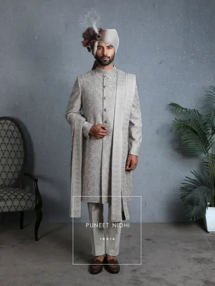 A full view of the coffee beige sherwani with its matching stole, showcasing a complete look that is both traditional and contemporary.