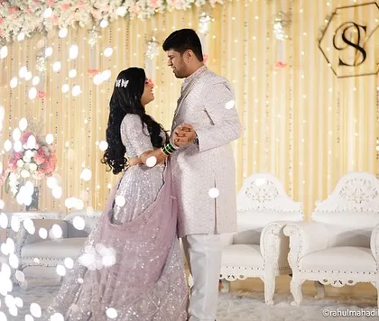 A romantic dance pose on the reception stage.