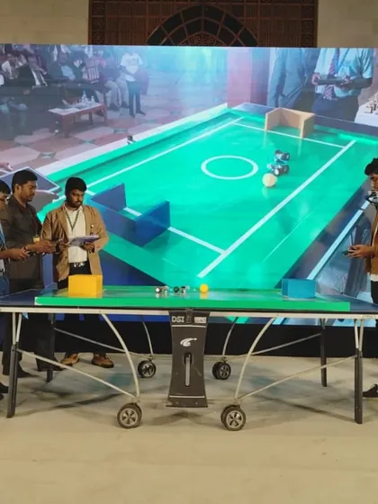 Students engage in a robotics football match at the INNOEX competition in Kuwait. These events provide a platform for our students to test their skills, collaborate, and compete on an international level.