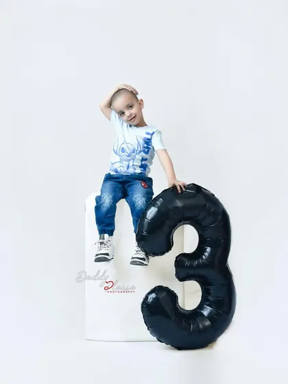 A cool and casual pose from the birthday boy during his studio session. This shows that I work to capture your child's individual personality.