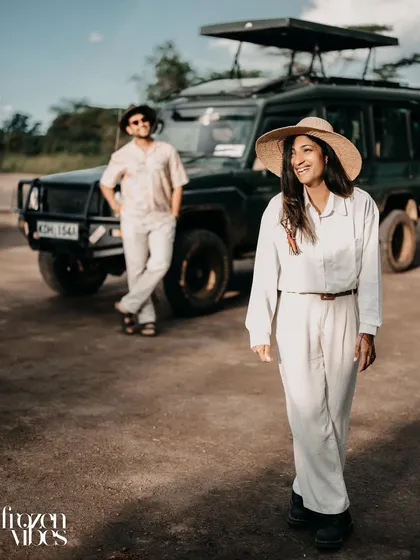 A candid shot of Nikita and Harshil during their Kenyan safari. Their relaxed poses and safari-chic outfits perfectly match the adventurous vibe of the shoot.