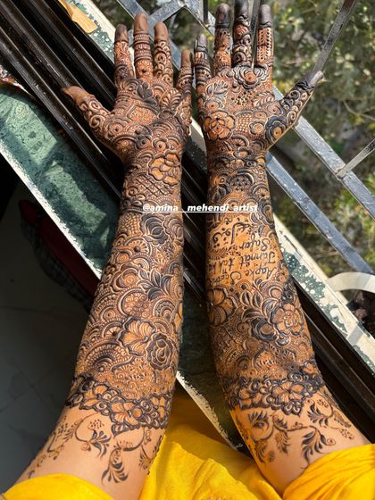 A full view of the design with the tribute to the bride's parents, showing how it's beautifully placed on the arms.