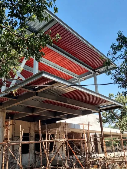 Another work-in-progress shot of Residence S, showing the layered steel roof structure. This design creates deep verandahs and covered pavilions that are in constant conversation with the surrounding landscape and trees.