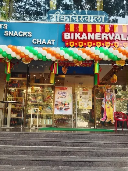A grand balloon arch in the colors of the Indian flag for a Bikanervala outlet on Republic Day. This type of entrance decoration makes a bold statement and welcomes customers for the special occasion.