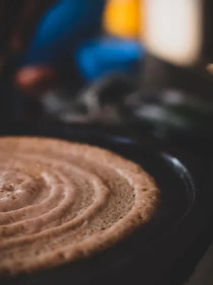 The perfect dosa, a staple of South Indian cuisine. We teach the art of fermentation and cooking to achieve this texture.