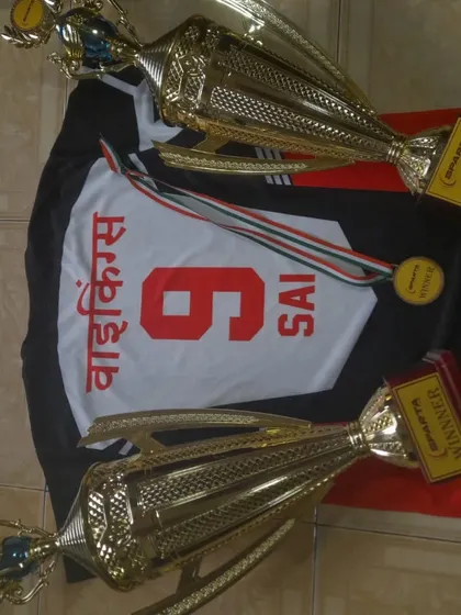 Two trophies, one jersey. Reflecting a tournament where we achieved both winner and runner up positions.
