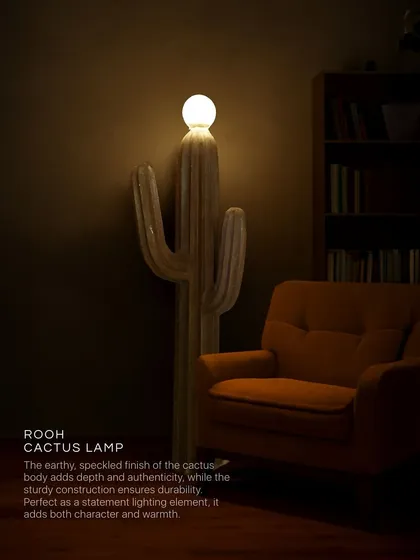 Our Rooh Cactus Lamp balances a sharp, sculptural form with a soft, inviting glow. The earthy, speckled finish of the concrete body adds depth and authenticity, making it a statement lighting element that brings both character and warmth to any corner, day or night.