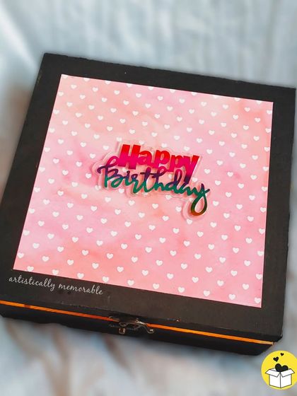 A pretty pink and black hamper box for her birthday. The holographic "Happy Birthday" on the lid adds a fun, modern touch.