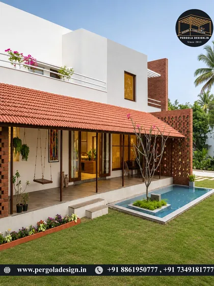 A beautiful backyard view of a home with a tiled roof patio. The space includes a swing and a small water feature, creating a serene and picturesque setting for outdoor living.