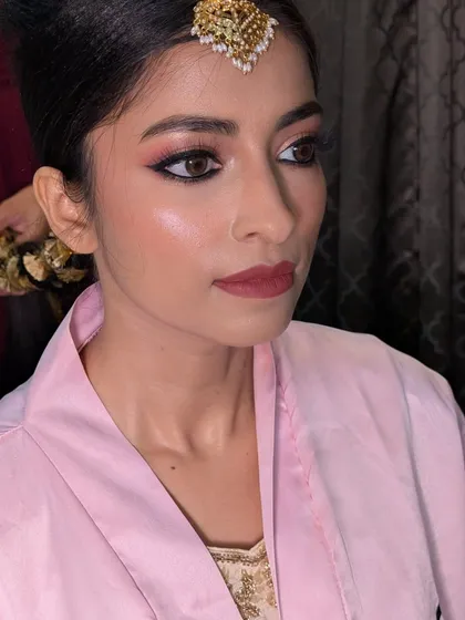 Another angle of the soft Nikkah makeup, showing the clean base and defined brows before the full jewellery and draping.