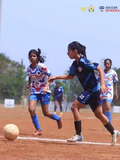 Prisha Patel, wearing number 10, skillfully controls the ball during an SGFI Nationals match. Her journey to captaining Team ISSO is a result of years of commitment.