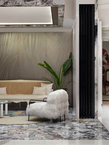 This living room mock-up within the tile showroom was designed to showcase the versatility of tiles in every way imaginable. It's a testament to transforming spaces with timeless elegance and innovation.