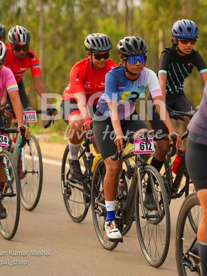The women's peloton, with a rider from the Racefit Coaching team at the front.