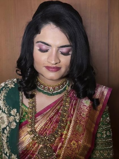 A close-up of Roopa's makeup, highlighting the blended eyeshadow and flawless base. I emphasize techniques that ensure makeup looks beautiful with eyes open or closed.