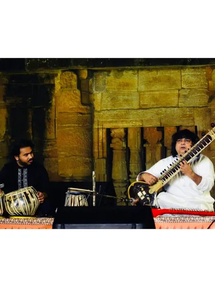 A collection of images from various concerts with the one and only Pandit Niladri Kumar ji. Whether on the sitar or his Zitar, every concert with him is a masterclass in creativity.