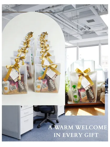 A warm welcome in every gift. These hampers, neatly arranged in an office setting, are ready to greet new team members and make them feel valued from day one.