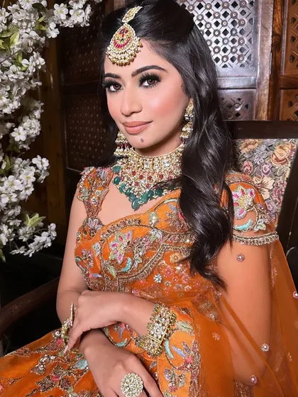 A close-up of this beautiful engagement makeup. The soft smokey eye, defined brows, and neutral lip colour enhance her natural beauty.