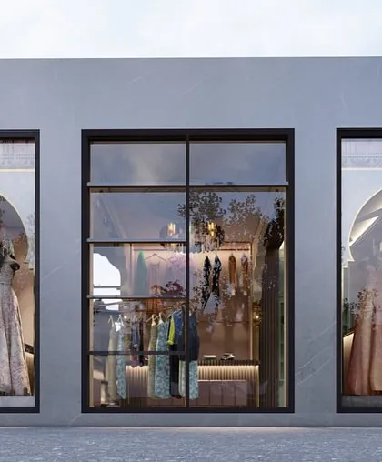 The exterior facade concept for the ladies' wear showroom. The large glass windows with arched details are designed to act as display cases, giving passersby a beautiful view of the collections inside.